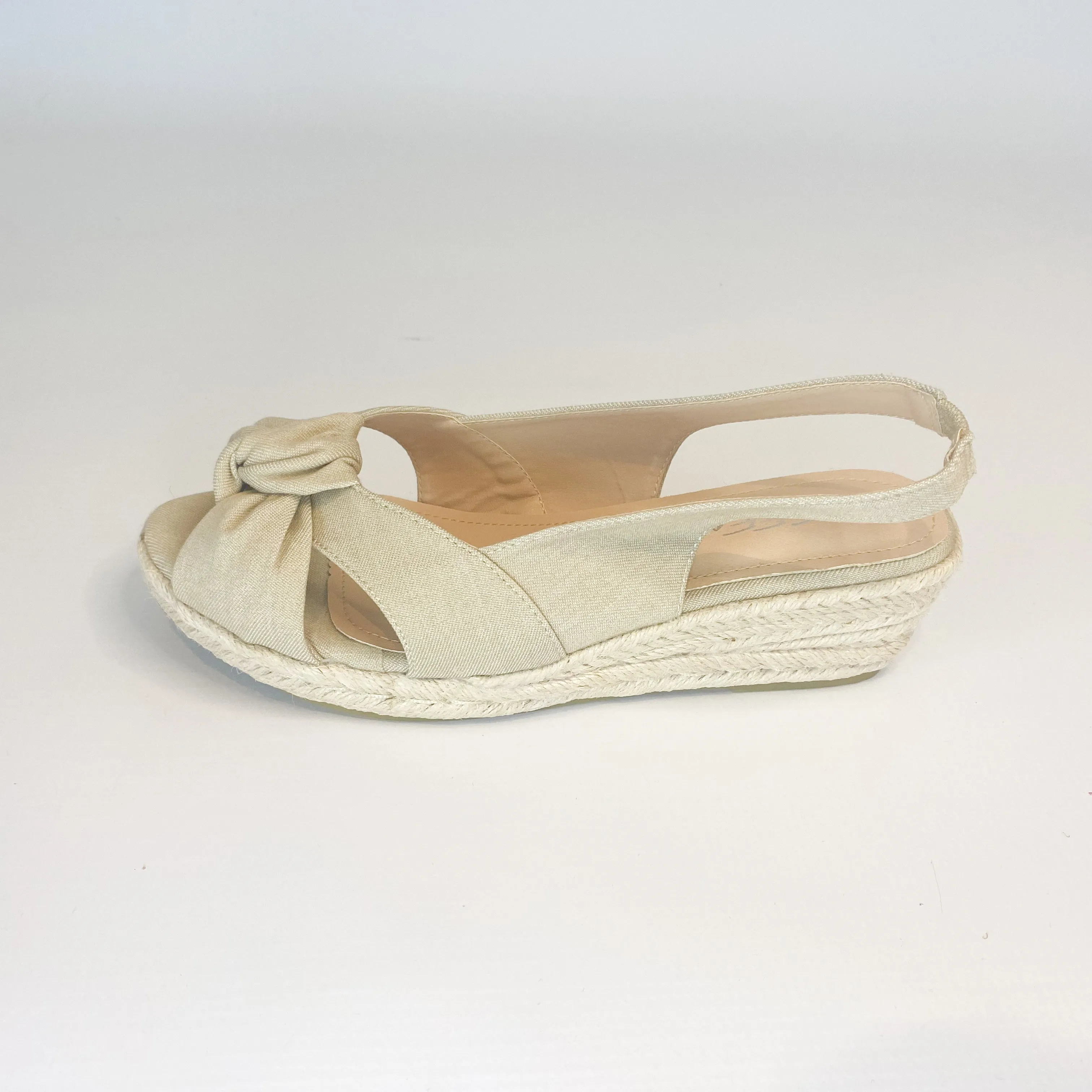 Geena beige knotted slingback wedge