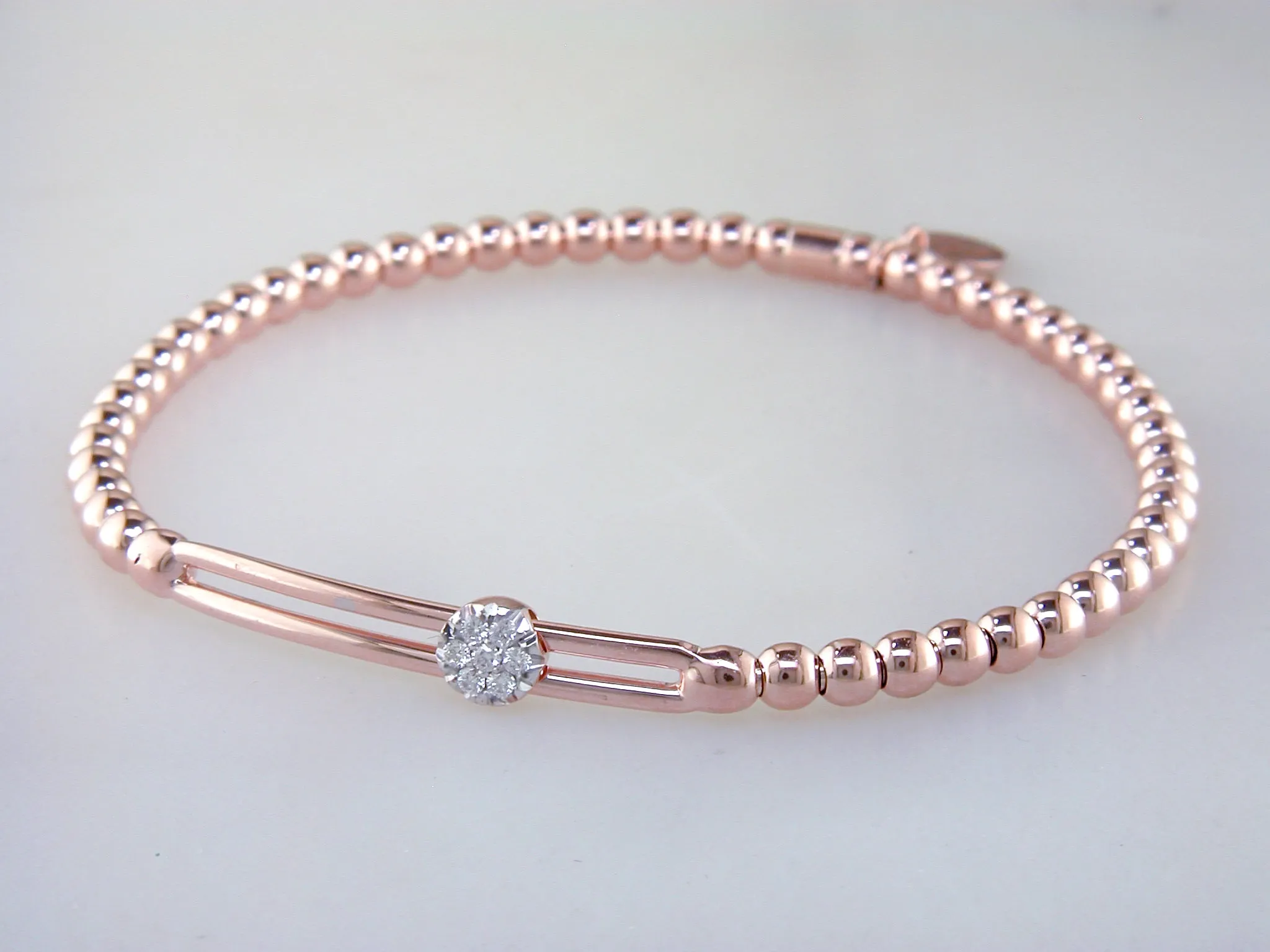 Hulchi Belluni Fidget Bracelet with Single Pave Diamond Moveable Station Rose Gold Stretch Stackable