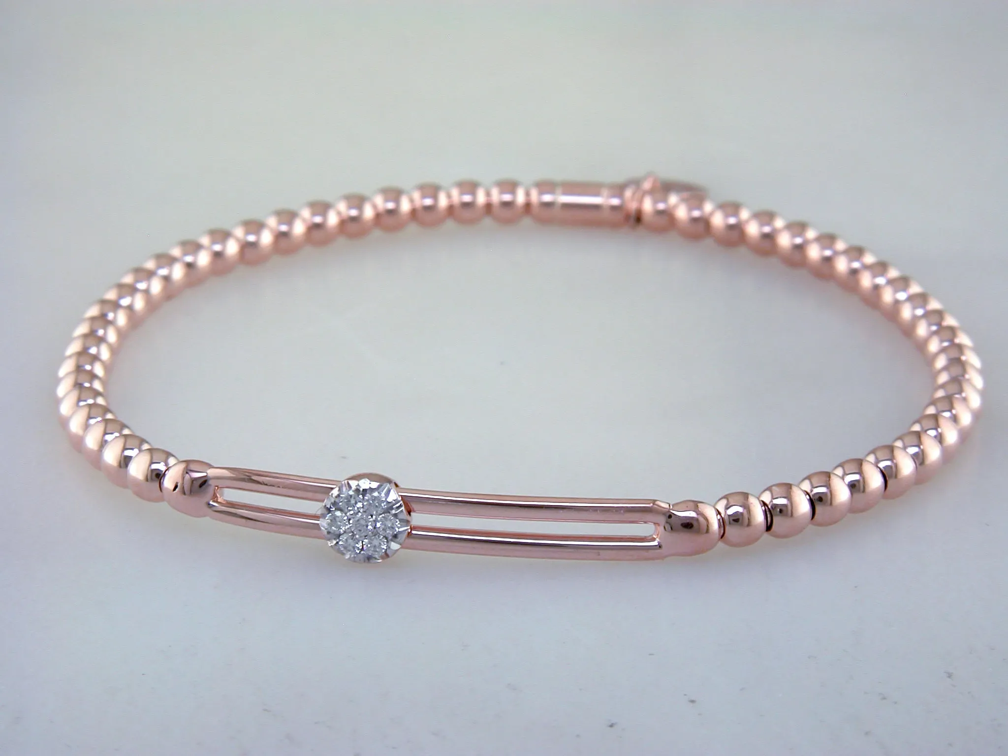 Hulchi Belluni Fidget Bracelet with Single Pave Diamond Moveable Station Rose Gold Stretch Stackable